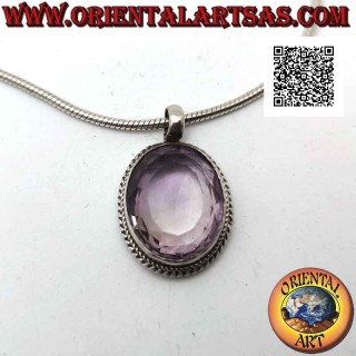 Ciondolo in argento con grande ametista naturale ovale sfaccettata contornata da intreccio