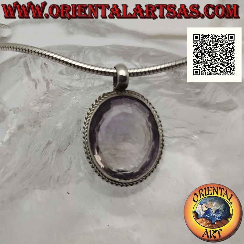 Ciondolo in argento con grande ametista naturale ovale sfaccettata contornata da intreccio