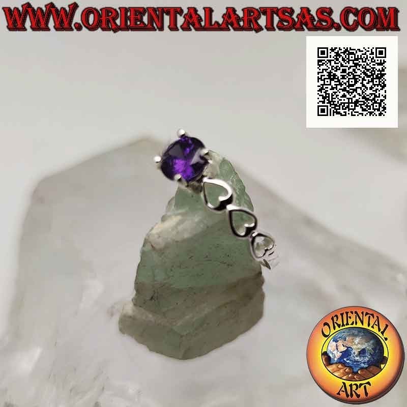 Solitaire silver ring with round synthetic amethyst set and perforated hearts on the sides