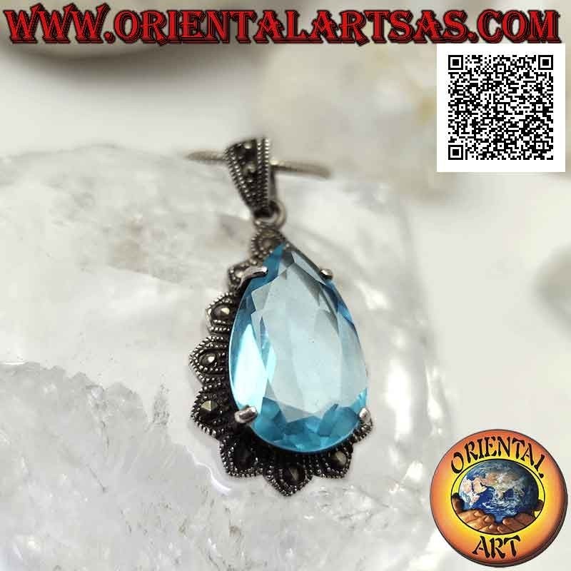 Colgante de plata con gran topacio azul en forma de lágrima engastado en una montura imperial tachonada con marcasita