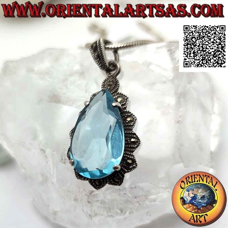 Colgante de plata con gran topacio azul en forma de lágrima engastado en una montura imperial tachonada con marcasita