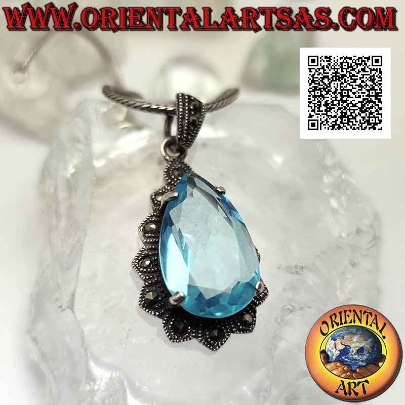Colgante de plata con gran topacio azul en forma de lágrima engastado en una montura imperial tachonada con marcasita