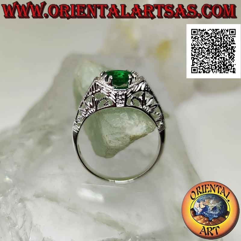 Silver ring with horizontal oval synthetic emerald set in a perforated baroque setting