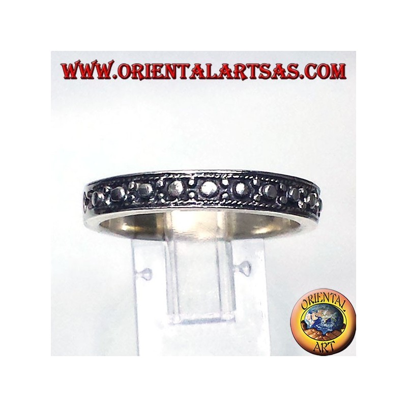 Solid 925 sterling silver band ring with raised beaded craftsmanship.