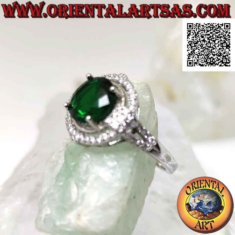 Silver ring with round synthetic emerald set surrounded by zircons with relief on the cardinal points