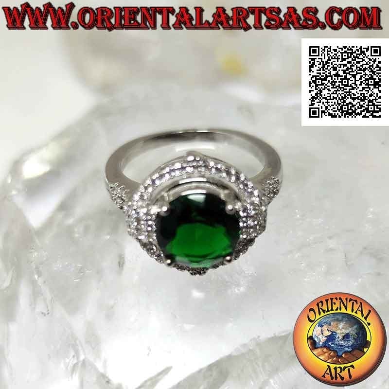 Silver ring with round synthetic emerald set surrounded by zircons with relief on the cardinal points