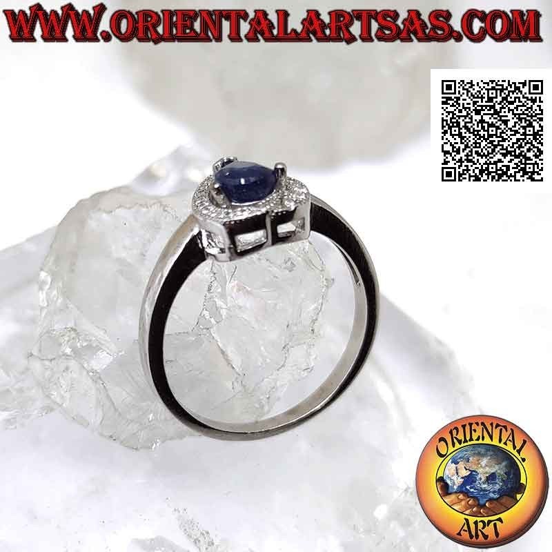 Bague en argent avec saphir synthétique en forme de larme serti entouré de zircons avec terminal superposé
