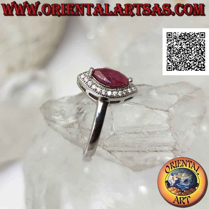 Silver ring with natural shuttle ruby set surrounded by cubic zirconia