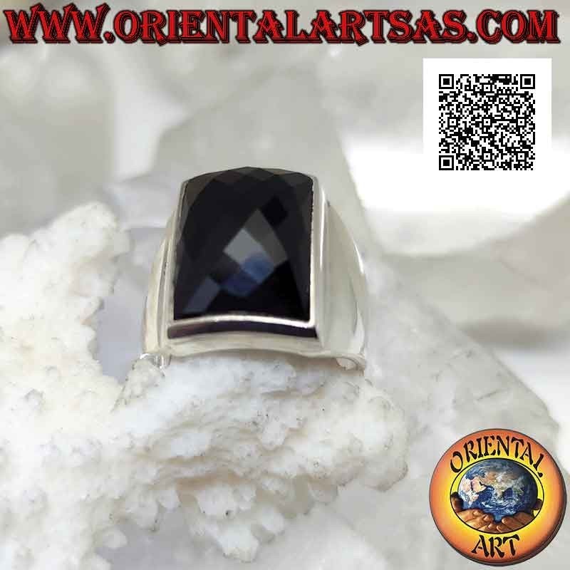 Silver ring with faceted rounded rectangular onyx on smooth frame with raised dial