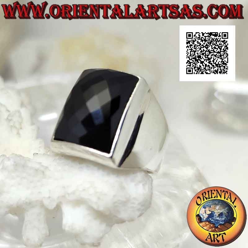 Silver ring with faceted rounded rectangular onyx on smooth frame with raised dial