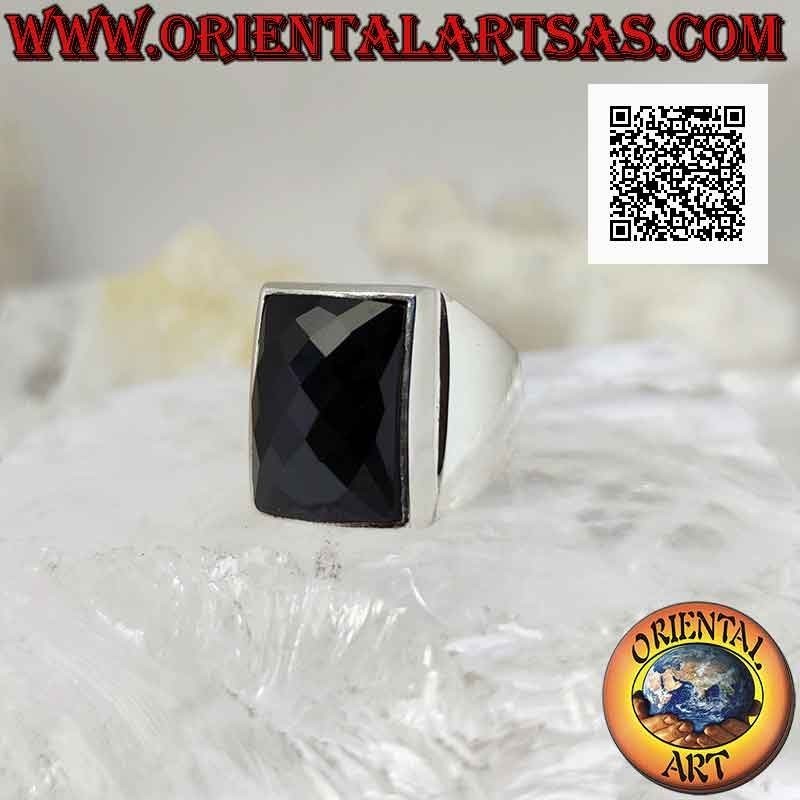 Silver ring with faceted rounded rectangular onyx on smooth frame with raised dial