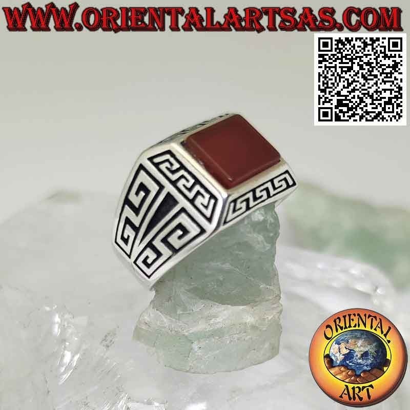 Silver ring with rectangular carnelian, surrounded by Greek in bas-relief