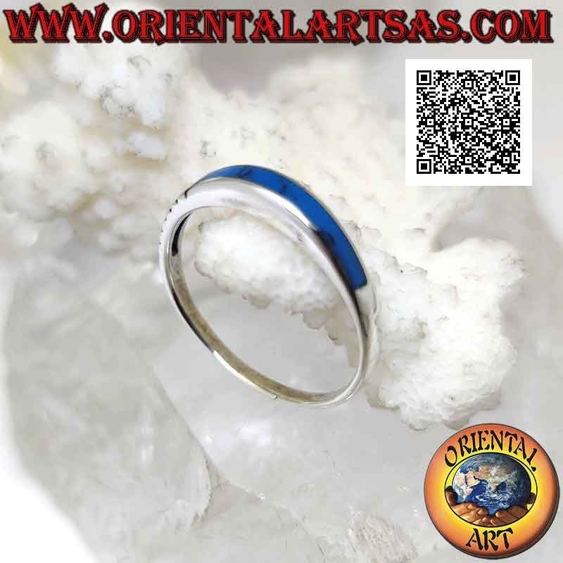 Bague en argent avec turquoise rectangulaire saillante d'un côté et gravures de l'autre