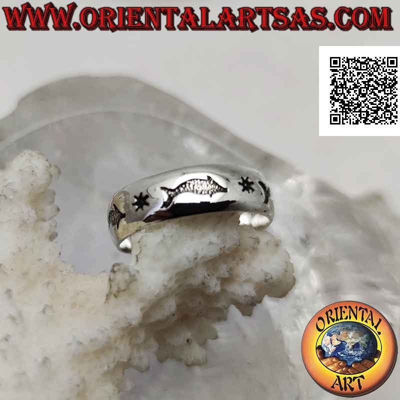 Silver band ring worked with a series of dolphins in bas-relief