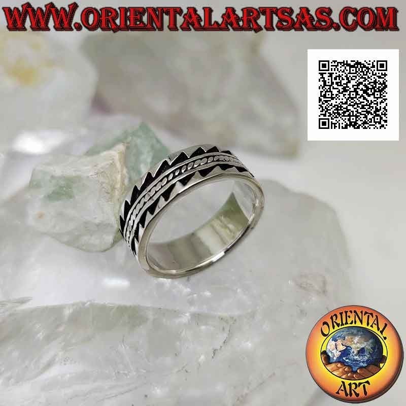 Silver ring with worked band with toothed bas-relief decoration
