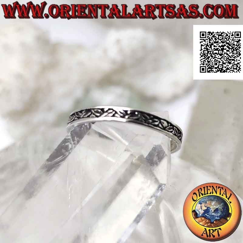 Silver ring with thin band worked with micro floral bas-relief decoration