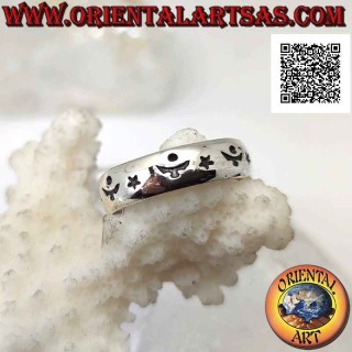 Bague en argent travaillée d'étoiles et décor astral alterné