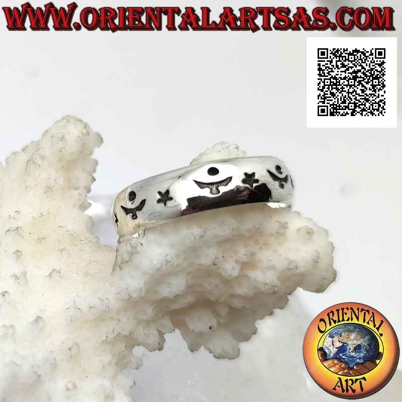 Silver band ring worked with stars and alternating astral decoration