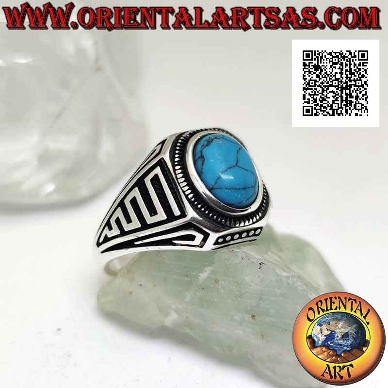 Bague en argent avec cabochon ovale turquoise et vagues en bas-relief sur les côtés