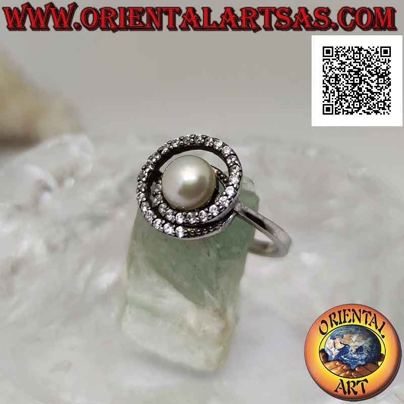 Silver ring with freshwater pearl in the center of a zircon spiral