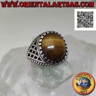 Silver ring with cabochon oval tiger eye and rhombuses engraved on the sides (A)