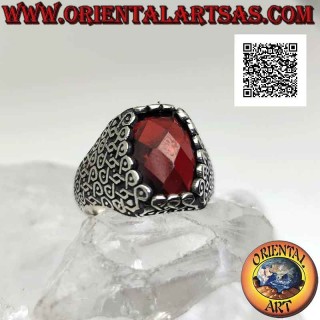 Silver ring with faceted oval garnet and geometric series of intertwined infinities on the sides