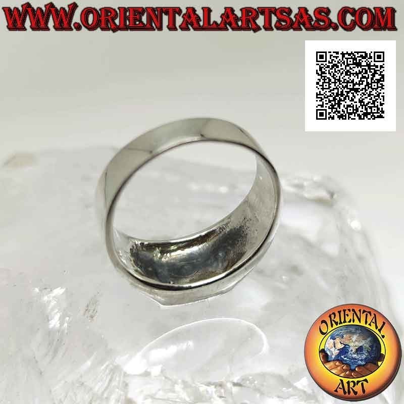 Silver ring with square green agate flush with the edge and bas-relief triquetra on the sides