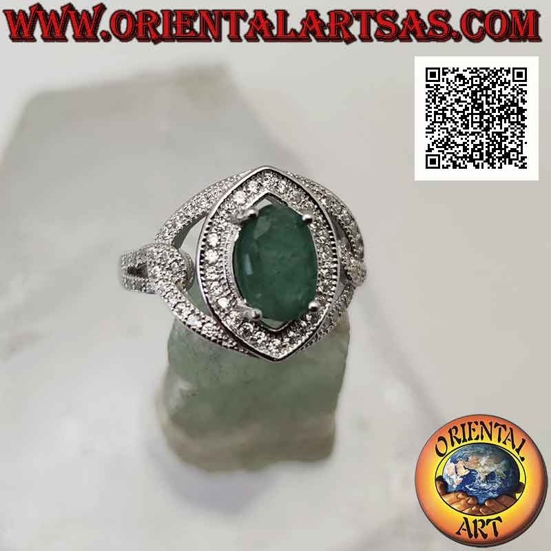 Silver ring with natural oval emerald set on a setting studded with white zircons