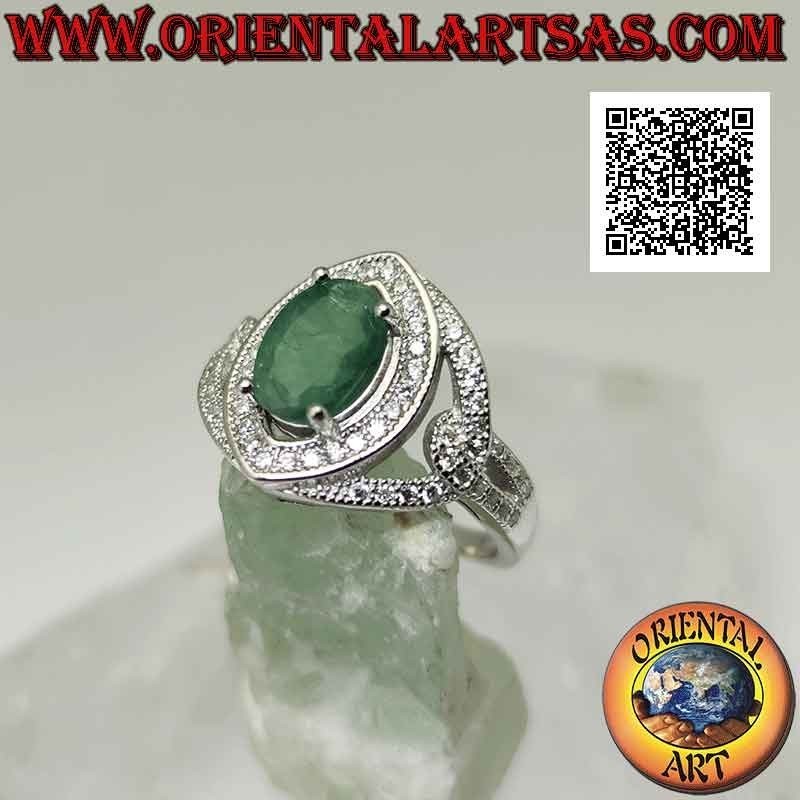 Silver ring with natural oval emerald set on a setting studded with white zircons