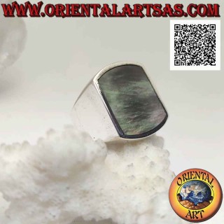 Silver ring with rectangular paua shell (abalone) curved on two sides flush with the edge on a smooth setting