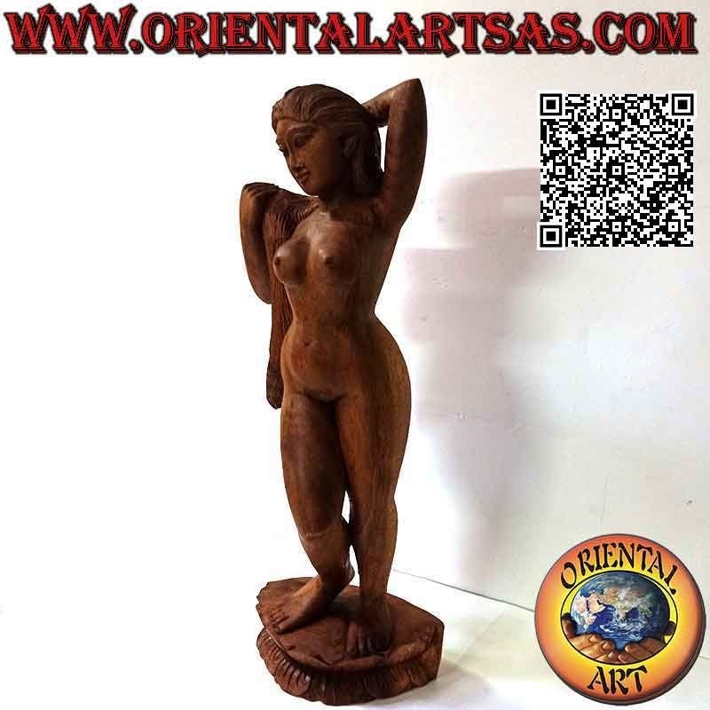 Statue sculpture d'une femme orientale nue posant réalisée dans un seul bloc de bois de suar (60 cm)