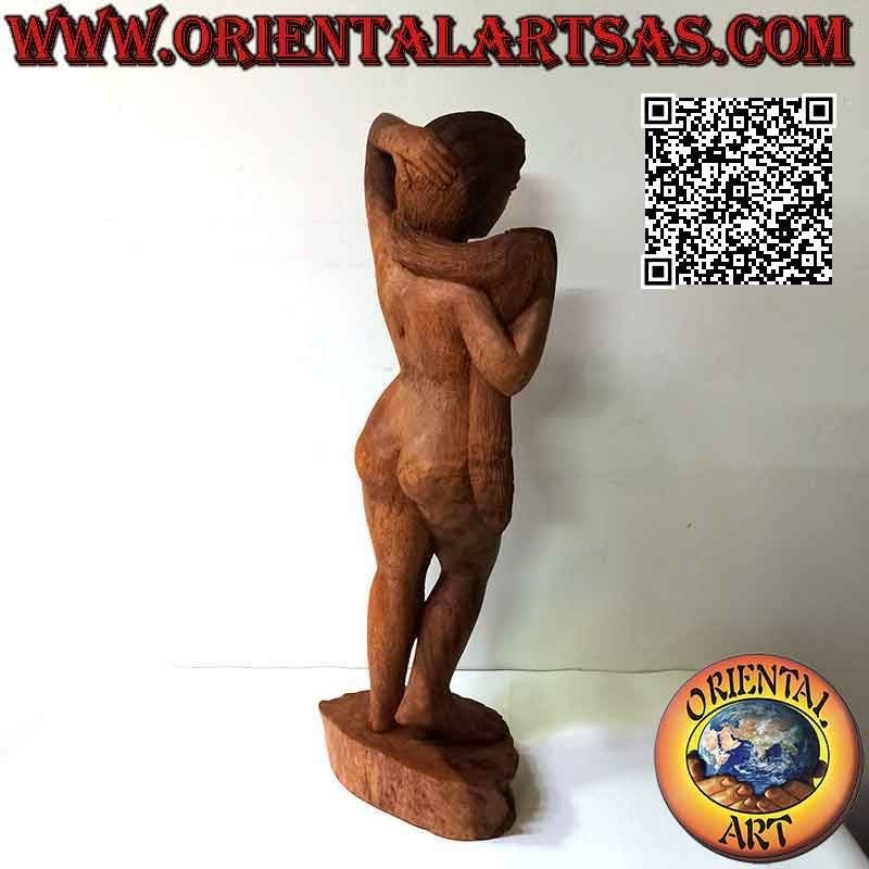 Scultura statua di una donna nuda orientale in posa realizzata da un unico blocco di legno di suar (60 cm)