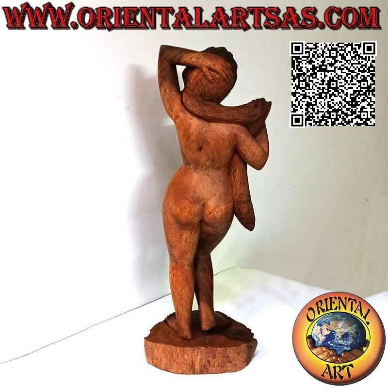 Statue sculpture d'une femme orientale nue posant réalisée dans un seul bloc de bois de suar (60 cm)