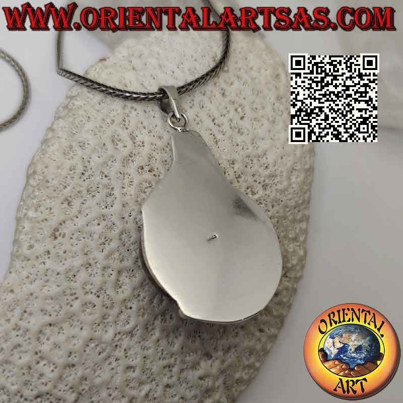 Silver pendant with large round Baltic amber on a smooth bas-relief setting