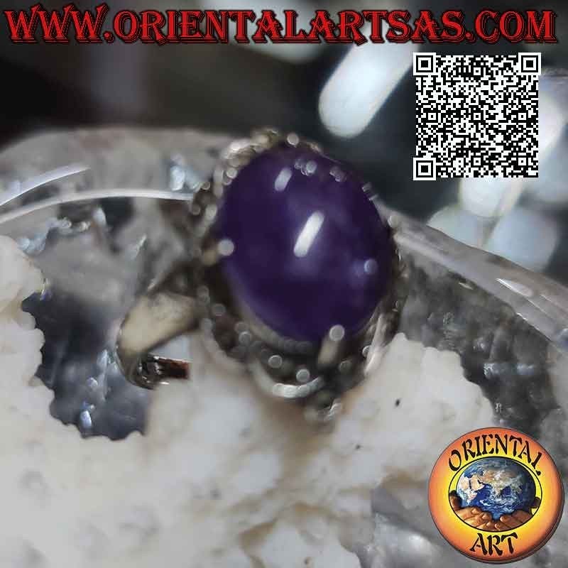 Anello in argento con ametista ovale cabochon incastonata incastonata su montatura tempestata di marcassite