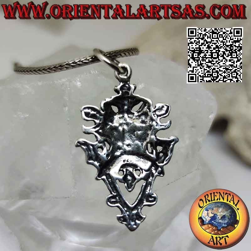 Silver pendant in the shape of "the Green Man" (Celtic figure symbol of life force)