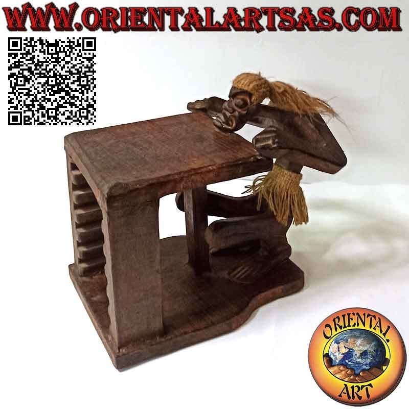 Porta CD de estilo primitivo con escultura de un aborigen en madera de teca (26 cm)