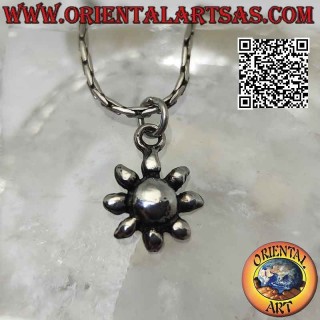Smooth silver pendant in the shape of a sun or small flower