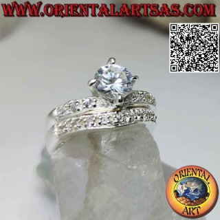 Bague en argent, paire d'anneaux à moitié cloutés de zircons blancs sertis d'un rond central