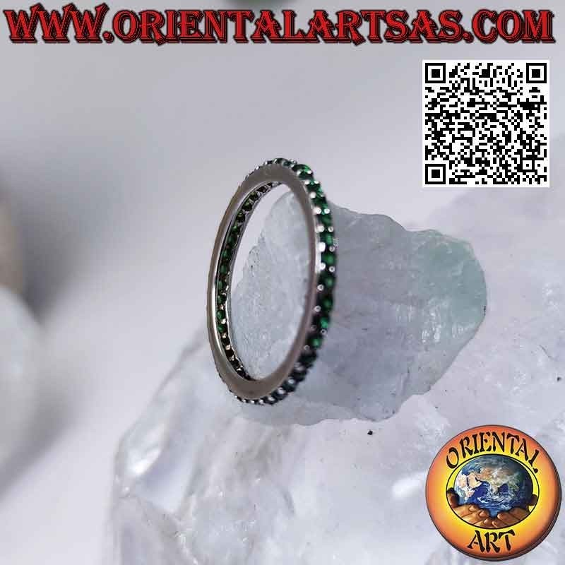Silver ring with "Eternity" band studded with green zircons (2 mm)