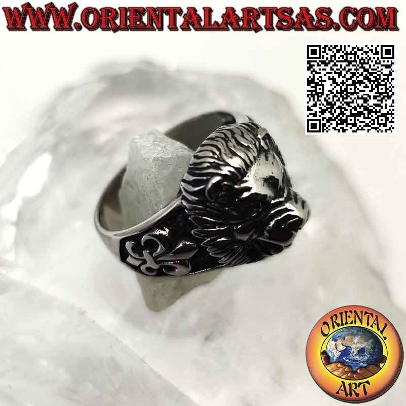 Surgical steel ring (316L), lion head and lily in bas-relief on the sides