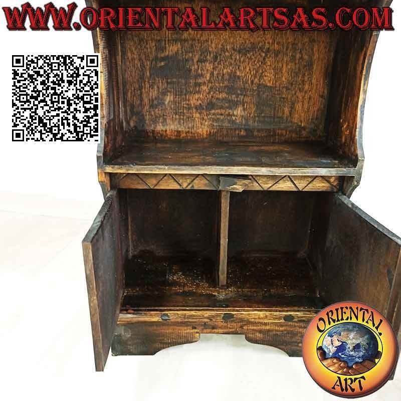 Small bookcase with three shelves and two doors with indigenous figures carved in balsa wood (130x50x23)