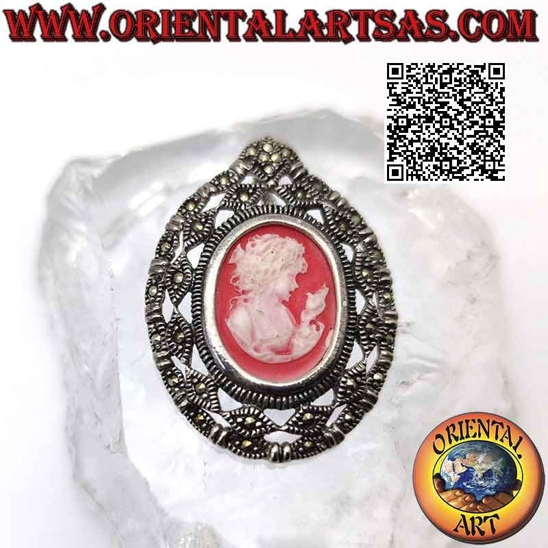 Silver pendant with oval cameo of the matron with calla lily and perforated frame studded with marcasite
