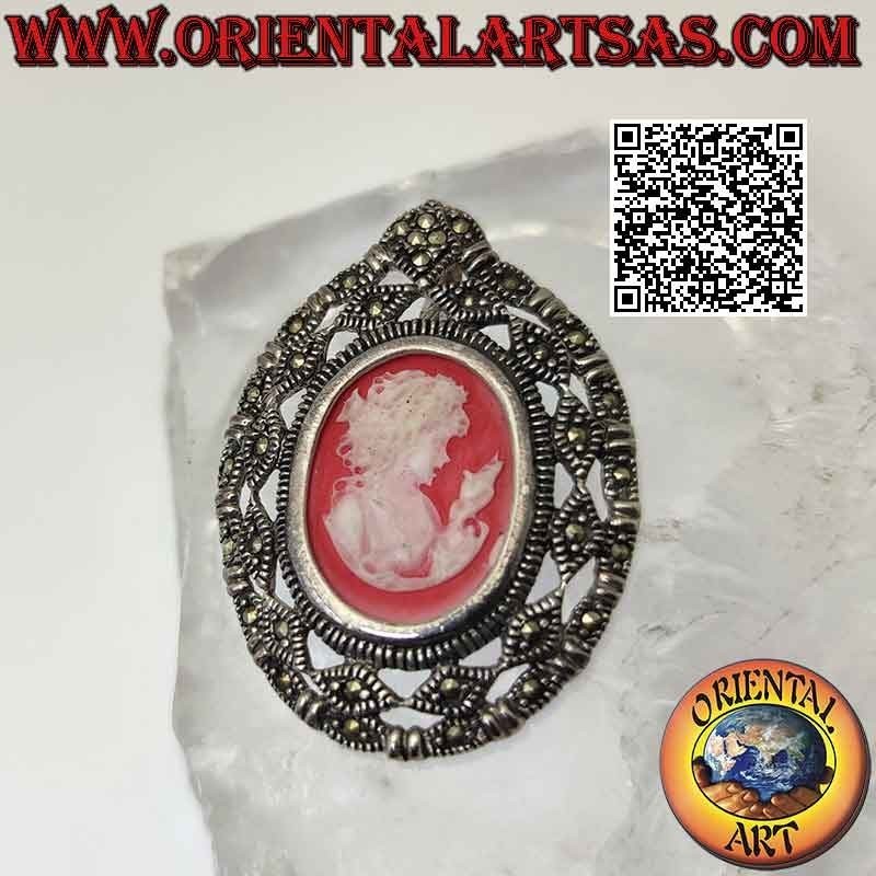 Silver pendant with oval cameo of the matron with calla lily and perforated frame studded with marcasite