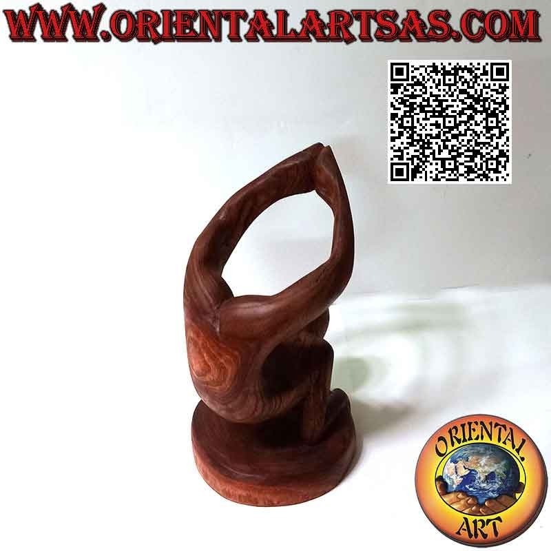 Bottle holder sculpture of an acrobat in artistic position in Suar wood