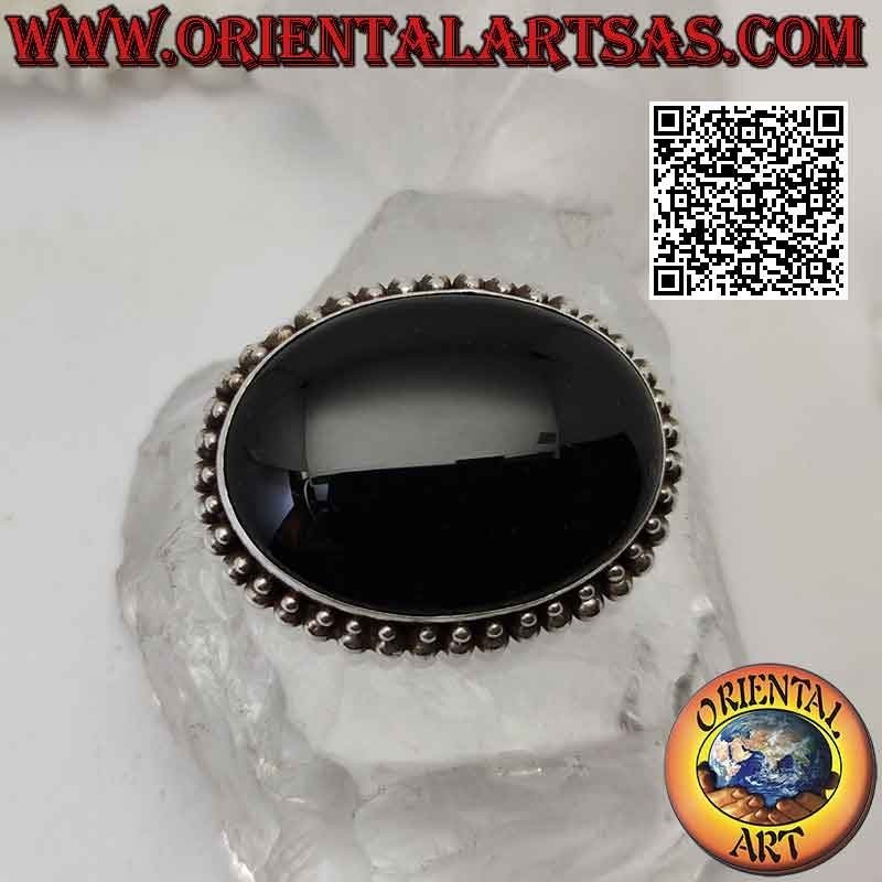 925 ‰ Silberbrosche mit großem ovalem Onyx-Cabochon, umgeben von zwei Reihen wachsender Kugeln