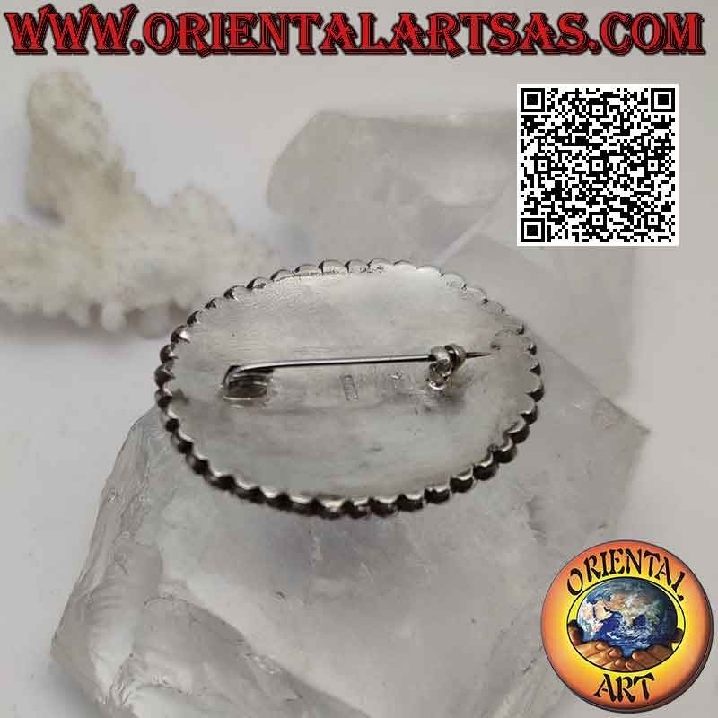 925 ‰ Silberbrosche mit großem ovalem Onyx-Cabochon, umgeben von zwei Reihen wachsender Kugeln