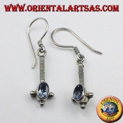 Silver earrings with oval faceted blue topaz