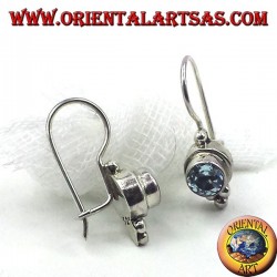 Silver earrings with blue topaz faceted round