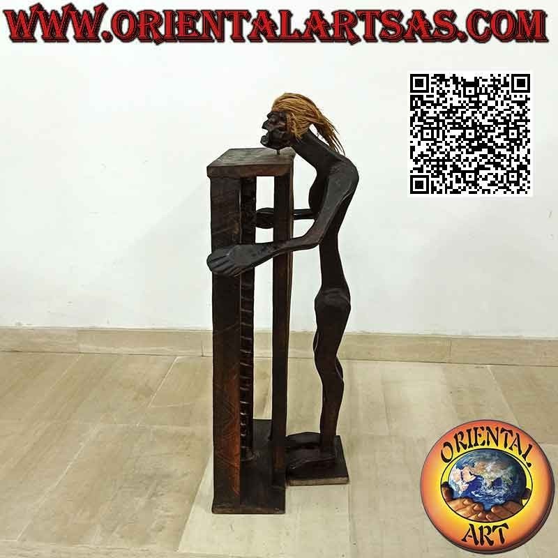 CD holder in primitive style with sculpture of an aboriginal in teak wood (80 cm)